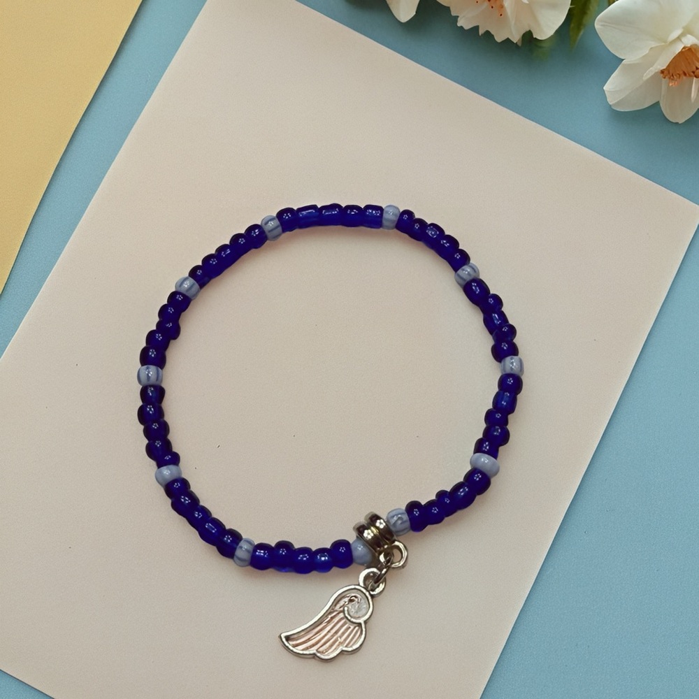 Cobalt Blue Beaded Bracelet with Pink Wing Charm - Picture 4 of 6